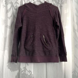 Roxy hoodie size small buttons at the neck with zippered pockets..